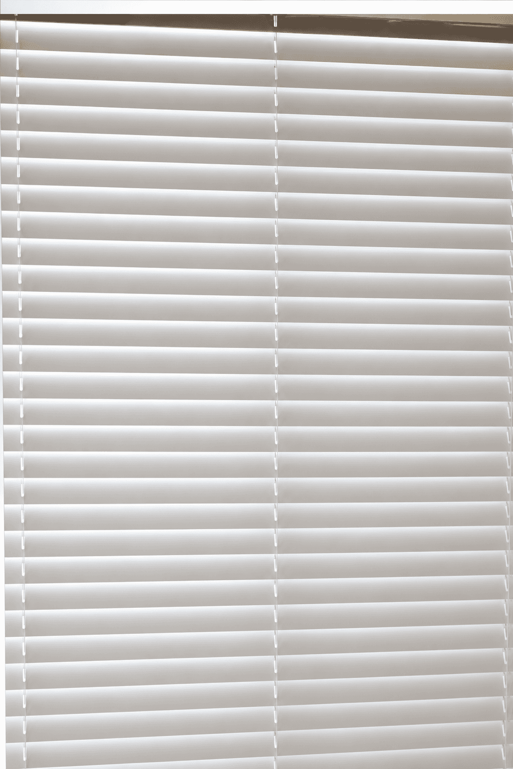The same window blinds wiped clean after a ShinySpaces cleaning